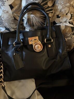 Michael Kors Black Leather Satchel with Gold Accents